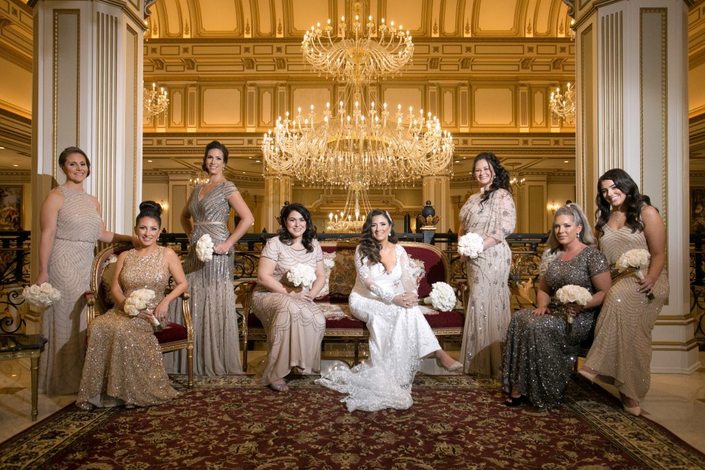 nj-wedding-venue-legacy-castle-bride-with-bridesmaids-in-gold-dresses