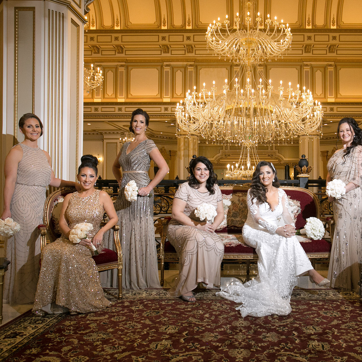 nj-wedding-venue-legacy-castle-bride-with-bridesmaids-in-gold-dresses