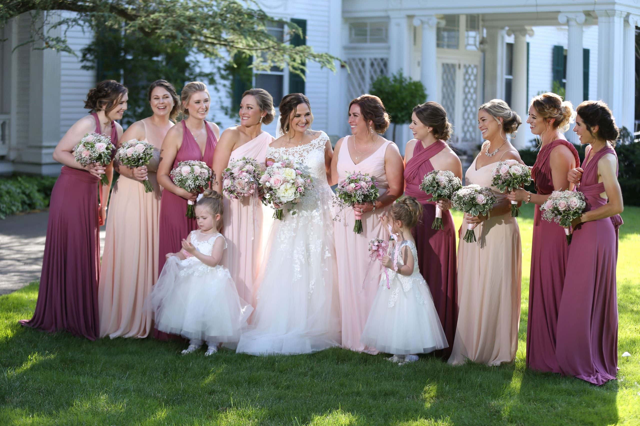 Bridal Party in pink bridesmaid dresses at the Morristown Arboretum