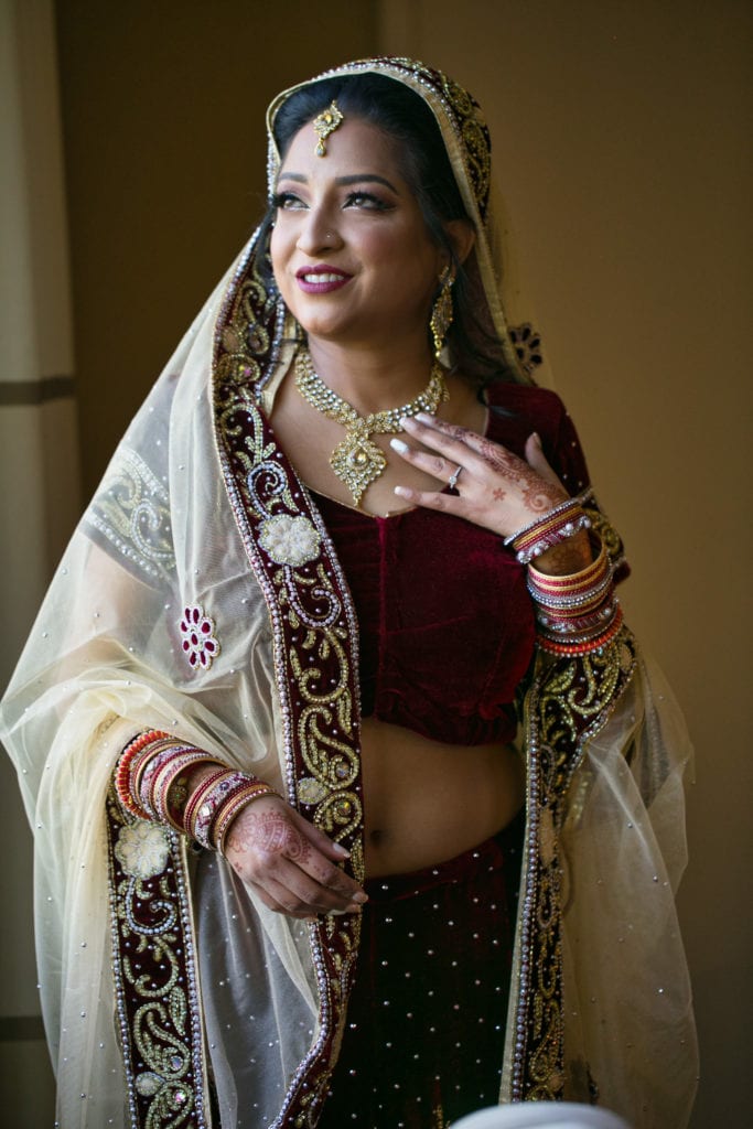 Curvy-indian-bride-posing-front-of-window