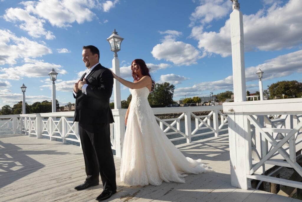 Bride and groom on dock for 1st look wedding venue marina del rey
