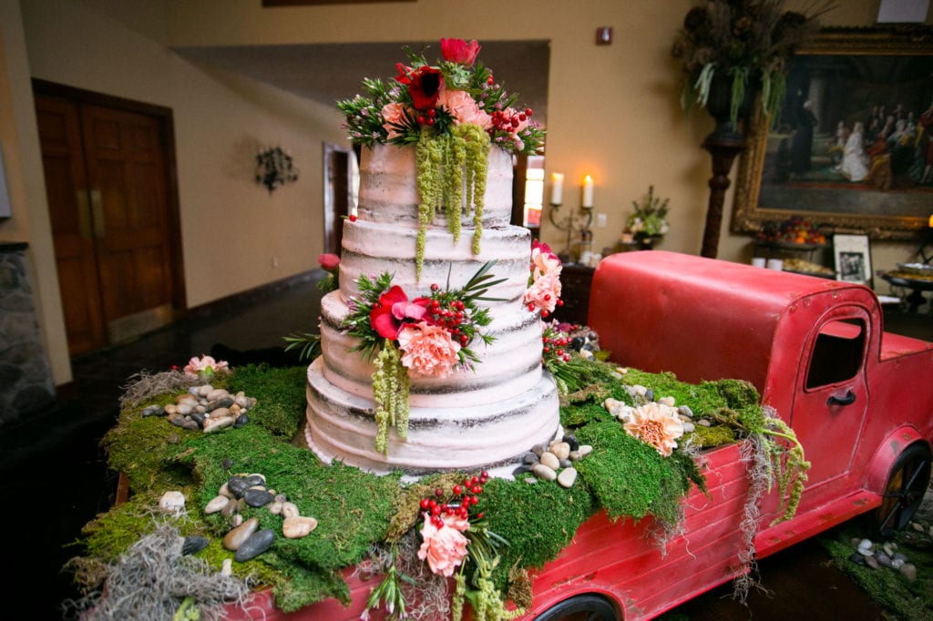 wedding venue- banquet style - multiwedding cake at stroudsmoor country inn in mini-pick-up truck in doors