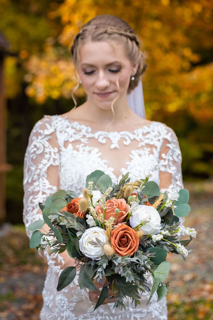 Young Bride standing in front of changing leaves at Wallenpaupack Creek Farms
